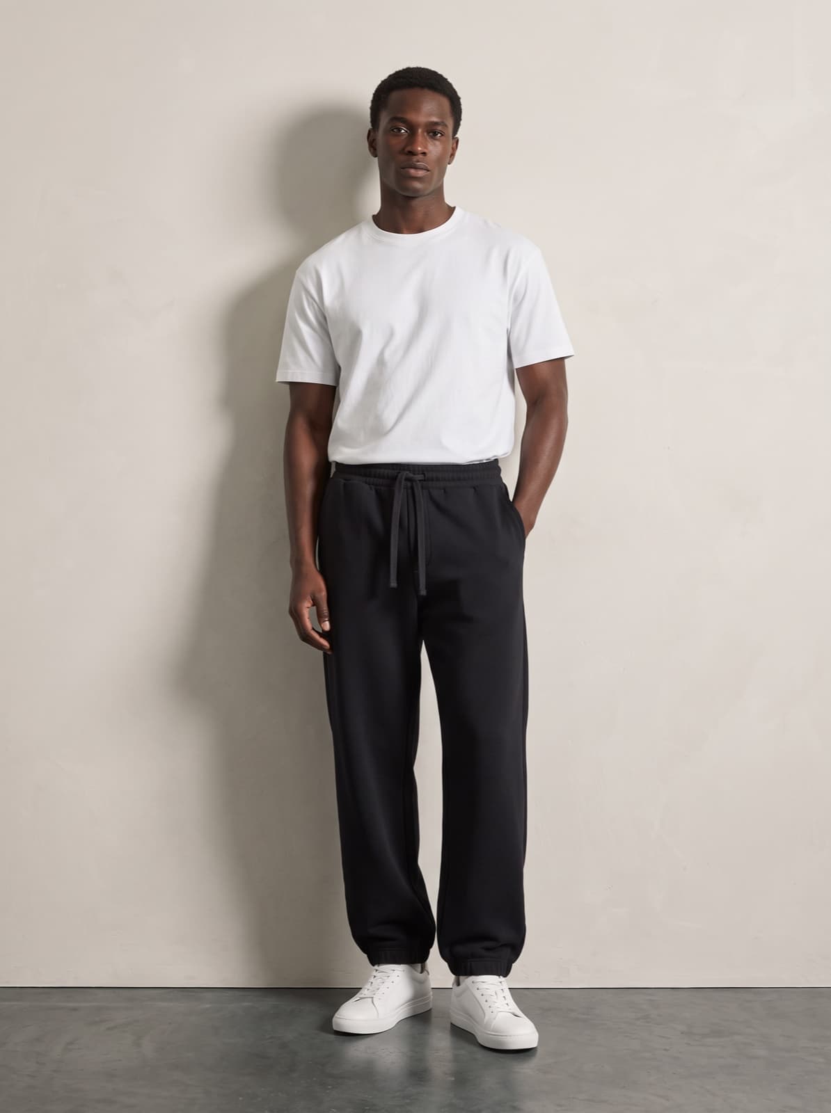 Chelsea Joggers in black worn with a plain white tee