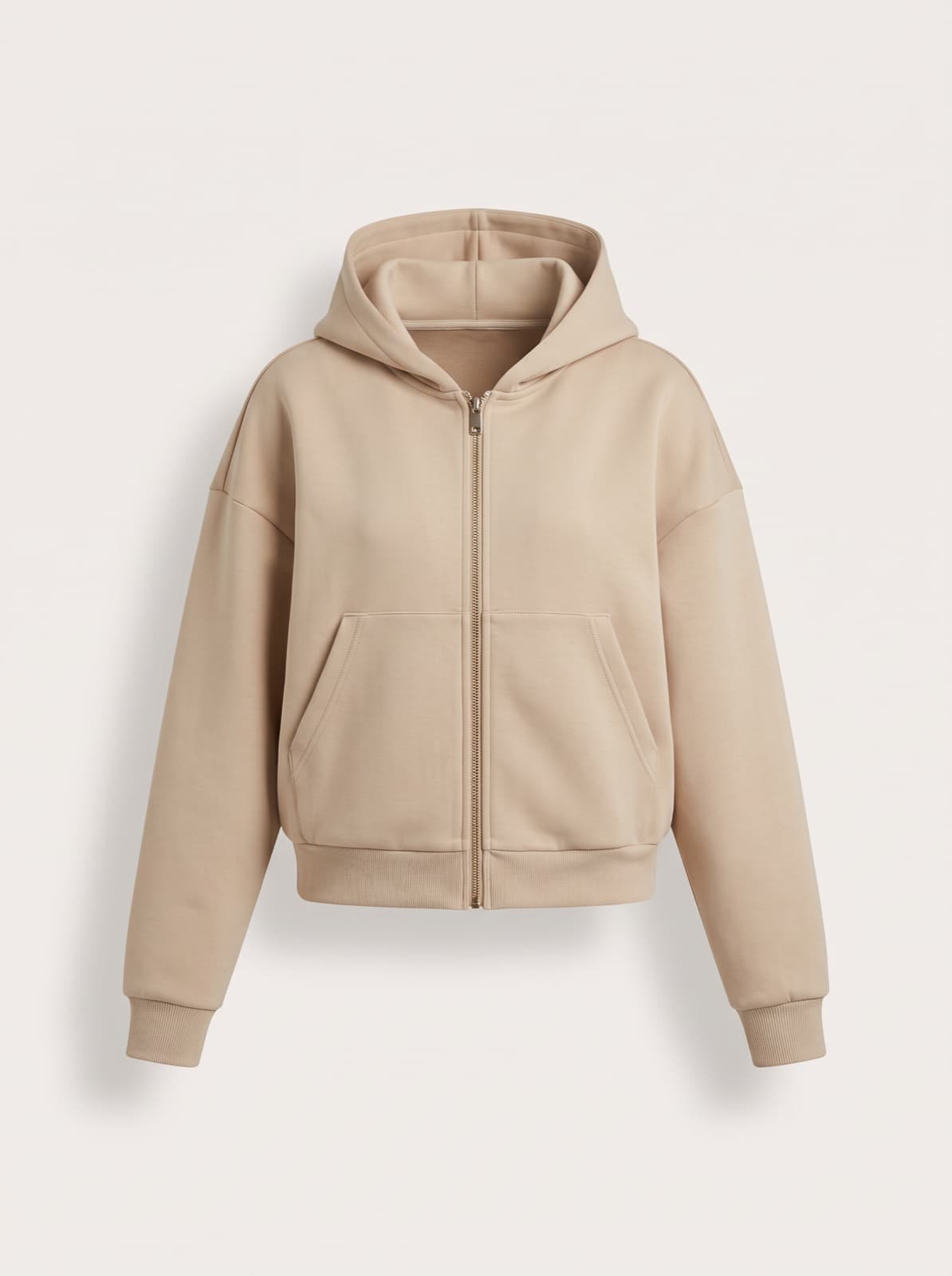 The Chelsea Zip Hoodie in beige, photographed flat