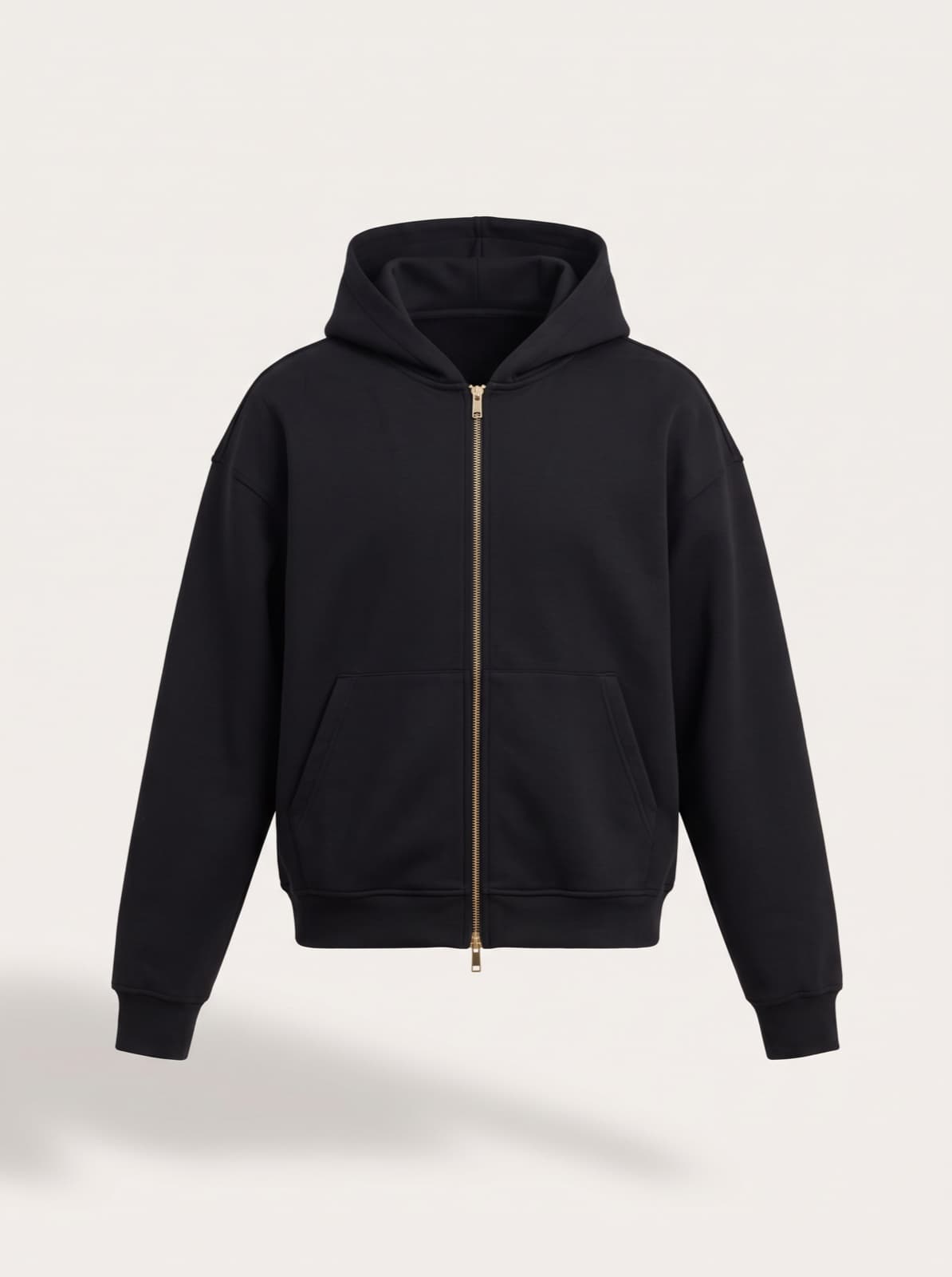 Chelsea Zip Hoodie in black photographed front on with no model