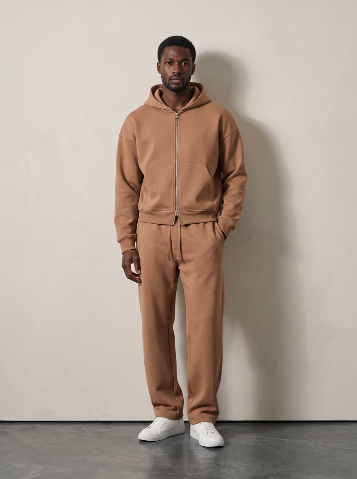 Chelsea Zip Hoodie in tan worn with matching joggers